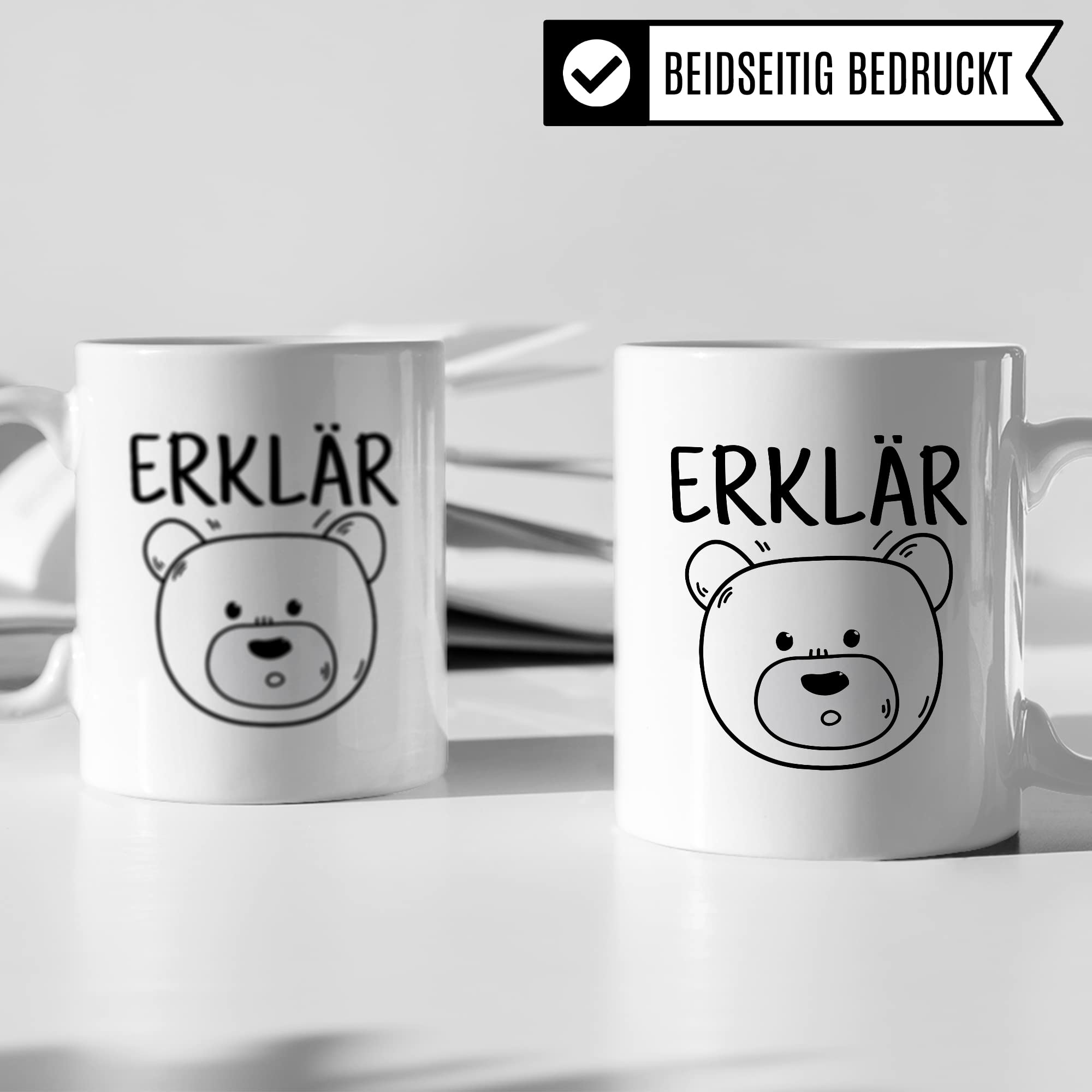 Tasse Erklärbär Geschenk Tasse mit Wortspiel Geschenkidee Kaffeetasse Tasse mit Spruch lustig Bären-Motiv Kaffee-Becher Teetasse Witztasse Humor Witz Deutschlehrer Germanistik