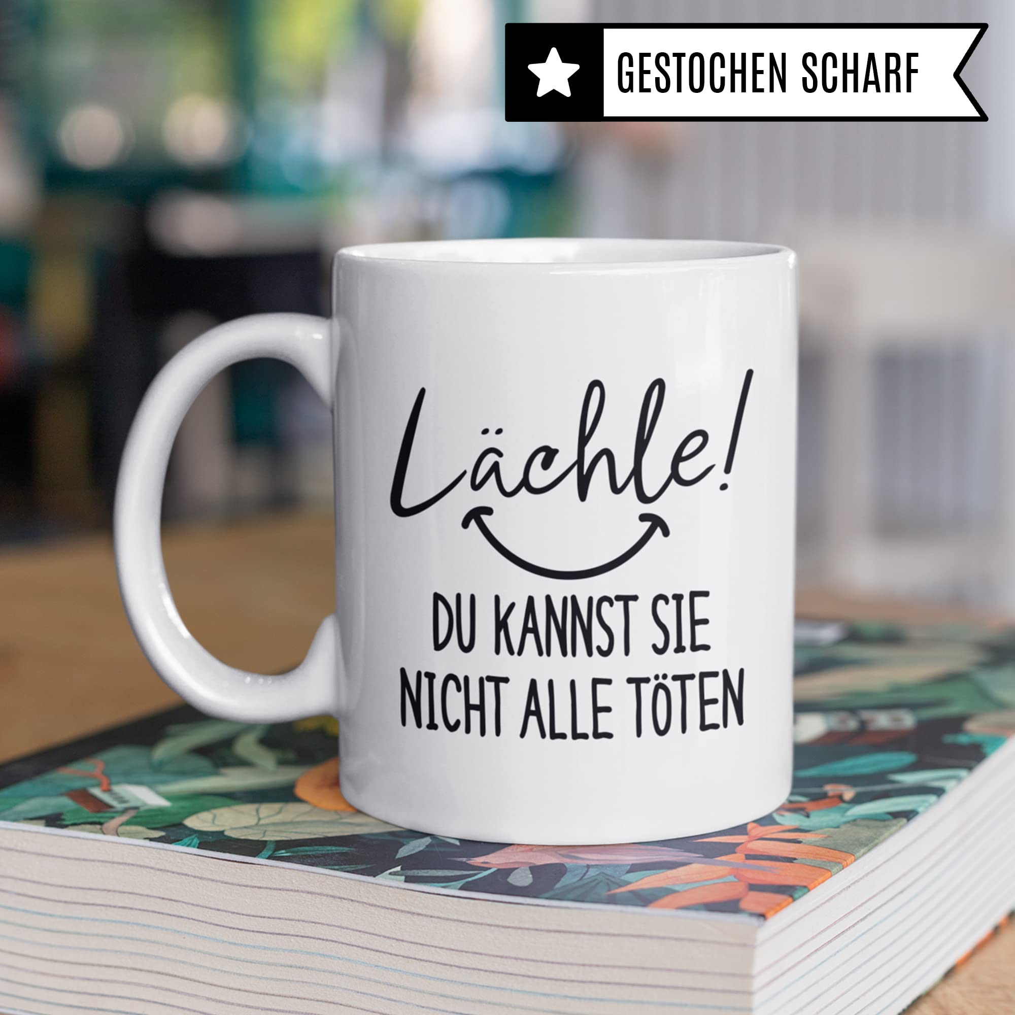 Kaffee-Tasse mit Spruch: Lächle Du Kannst Sie Nicht Alle Töten Tasse Büro für Kollege & Kollegin Becher lustig Geschenkidee